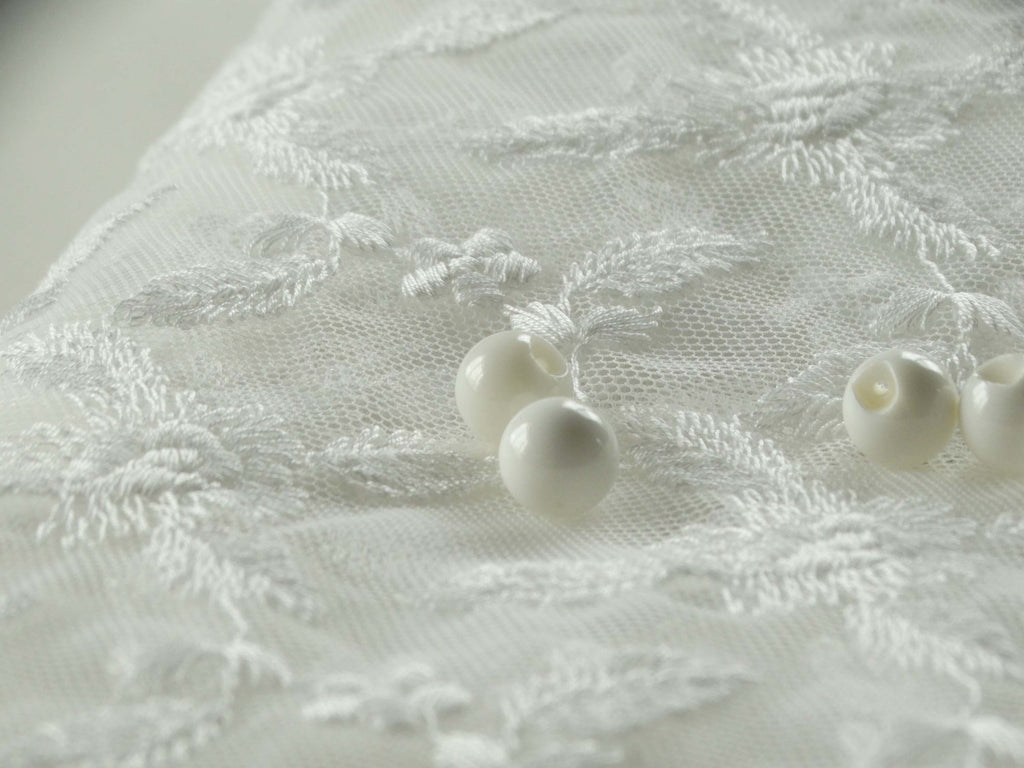 Bouton à coudre - La perle - Blanc