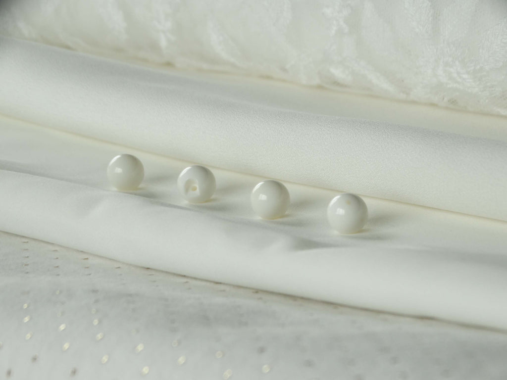 Bouton à coudre - La perle - Blanc