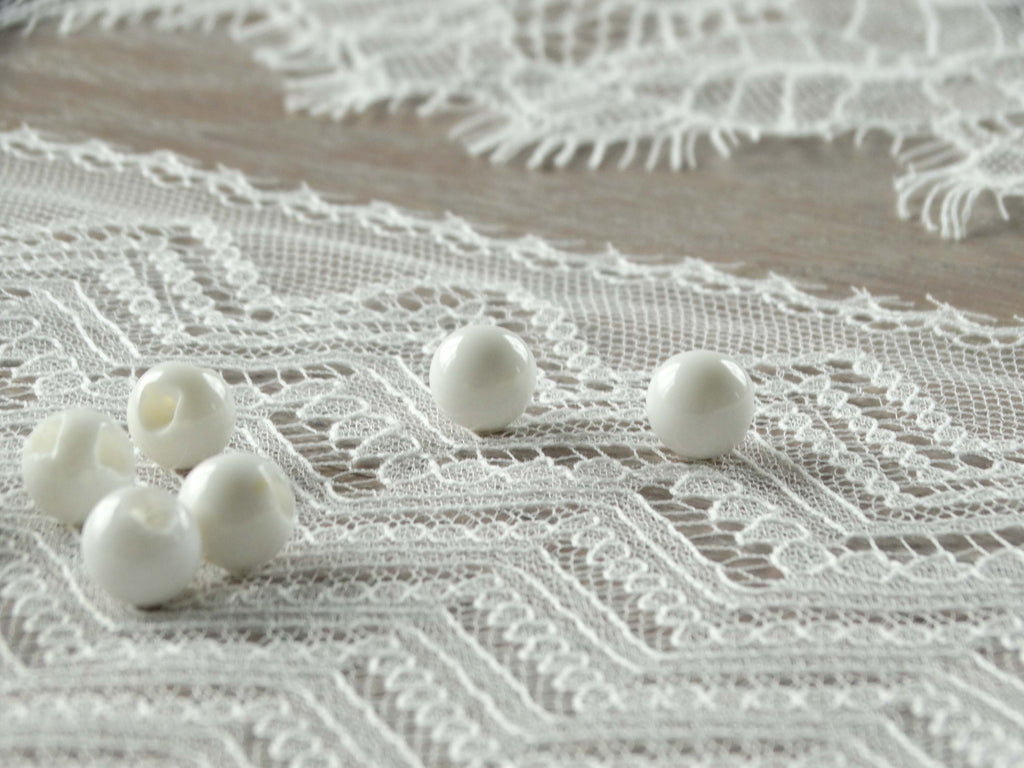 Bouton à coudre - La perle - Blanc